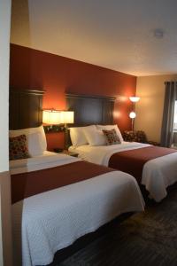 Säng eller sängar i ett rum på I M Hotel by Timberlake
