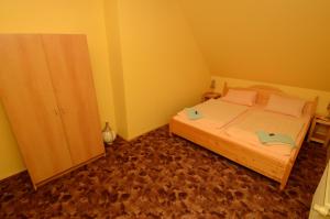 Postel nebo postele na pokoji v ubytování Pension Vladimír