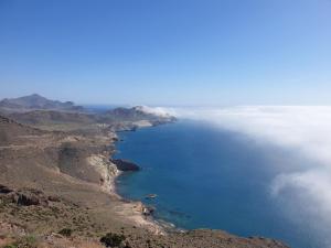 a view of the ocean from the top of a mountain at CASA BLANCA Apartments SAN JOSE in San José