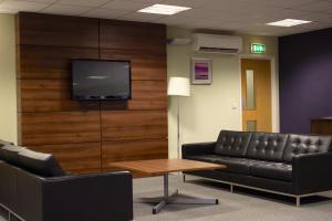 A seating area at Nightel Hotel