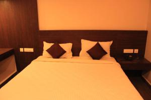 Imagem da galeria de Temple Stays - Friendliness & Cleanliness Room em Kumbakonam mais 15 fotografias