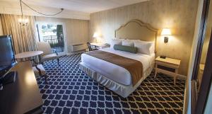 A bed or beds in a room at Molly Pitcher Inn