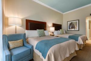 A bed or beds in a room at Omni Amelia Island Resort