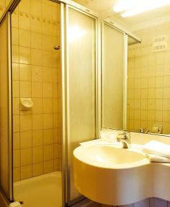 Kúpeľňa v ubytovaní Hotel Post