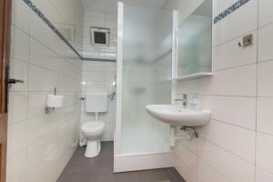 Kúpeľňa v ubytovaní Apartment Robinzon Lantana