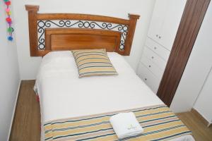 Postel nebo postele na pokoji v ubytování Barranco Wasi