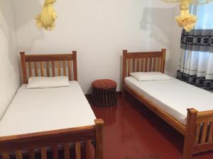 Postel nebo postele na pokoji v ubytování Best hostel Yala