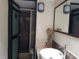 Vannituba majutusasutuses Xplora Hostel Cusco