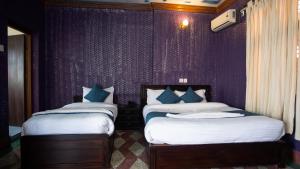 Katil atau katil-katil dalam bilik di Hotel Green Horizon