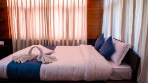 Katil atau katil-katil dalam bilik di Hotel Green Horizon