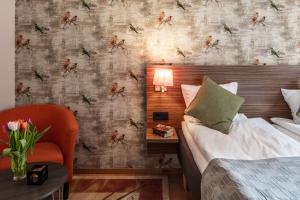 Postel nebo postele na pokoji v ubytování SPiS Hotell Naran