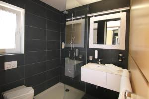 Koupelna v ubytování NU Hotel by WMM Hotels