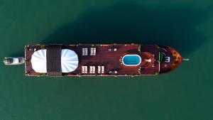 an overhead view of a boat in the water at Orchid Premium Cruise in Ha Long