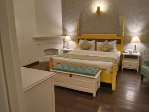 Postel nebo postele na pokoji v ubytování Hotel Pine Retreat Mallroad