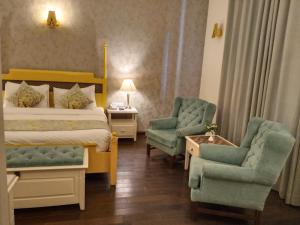 Postel nebo postele na pokoji v ubytování Hotel Pine Retreat Mallroad