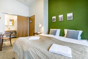 
Ein Bett oder Betten in einem Zimmer der Unterkunft Grimur Hotel
