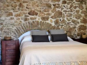 A bed or beds in a room at TRIPERIA 25