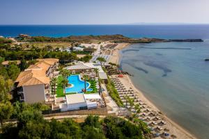 an aerial view of the resort and the beach at Koukis club in Vasilikos
