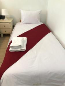 Postel nebo postele na pokoji v ubytování Academy Hotel