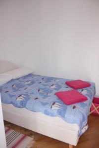 Voodi või voodid majutusasutuse Apartments JTV Simuni toas