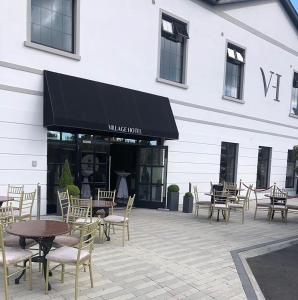 Εστιατόριο ή άλλο μέρος για φαγητό στο The Village Hotel, Bar and Restaurant