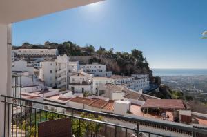 a view of the town from the balcony of a house at Apartment Vista de Pájaro in Mijas