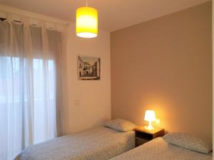 Posteľ alebo postele v izbe v ubytovaní Apartamento con Terraza a 5 min playa