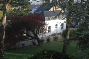 Jardin de l'établissement Gîte de la Conciergerie du Cheval Blanc
