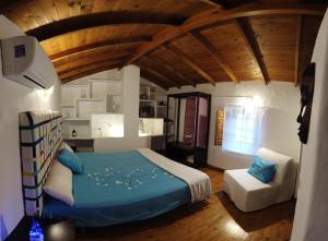 A bed or beds in a room at Molino de Simón