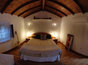 A bed or beds in a room at Molino de Simón