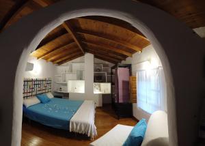 A bed or beds in a room at Molino de Simón