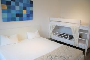 Ein Etagenbett oder Etagenbetten in einem Zimmer der Unterkunft Ferienwohnung Erholung in Altastenberg