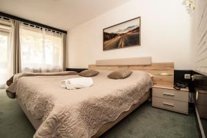 Krevet ili kreveti u jedinici u okviru objekta Hotel Faraon