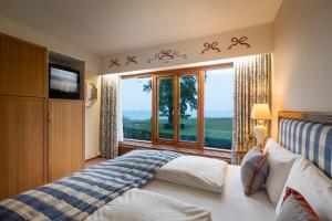 Katil atau katil-katil dalam bilik di Hotel Hesselet