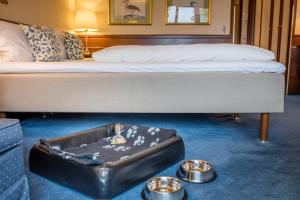 Katil atau katil-katil dalam bilik di Hotel Hesselet