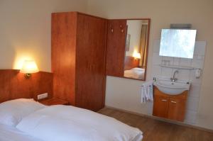 Koupelna v ubytování Hotel Wikinger Hof