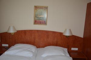 Postel nebo postele na pokoji v ubytování Hotel Wikinger Hof