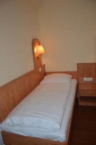 Postel nebo postele na pokoji v ubytování Hotel Wikinger Hof
