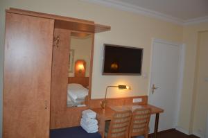TV a/nebo společenská místnost v ubytování Hotel Wikinger Hof
