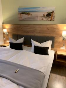 Postel nebo postele na pokoji v ubytování City-Hotel-Wolgast