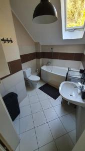 Koupelna v ubytování P.D.S APARTAMENT + 12 fotografií