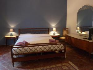 Postel nebo postele na pokoji v ubytování La Durlindana B&B