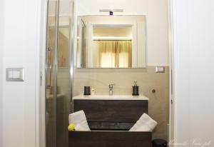 Ванна кімната в SEAFRONT APARTMENT SALERNO