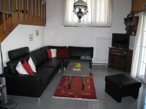 Un lugar para sentarse en Ferienhaus Ahorn