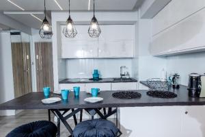 Kuchyňa alebo kuchynka v ubytovaní Resort Apartamenty Klifowa Rewal 27