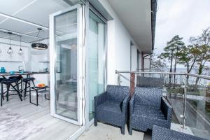 Balkón alebo terasa v ubytovaní Resort Apartamenty Klifowa Rewal 27