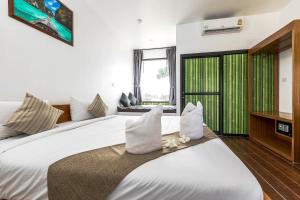 Cama o camas de una habitación en Phi Phi Chang Grand Resort