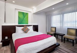 Voodi või voodid majutusasutuse R Hotel Kingston toas