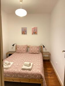 Ein Bett oder Betten in einem Zimmer der Unterkunft COM•BRO Apartment