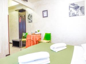 Postel nebo postele na pokoji v ubytování B&B Morelli 1